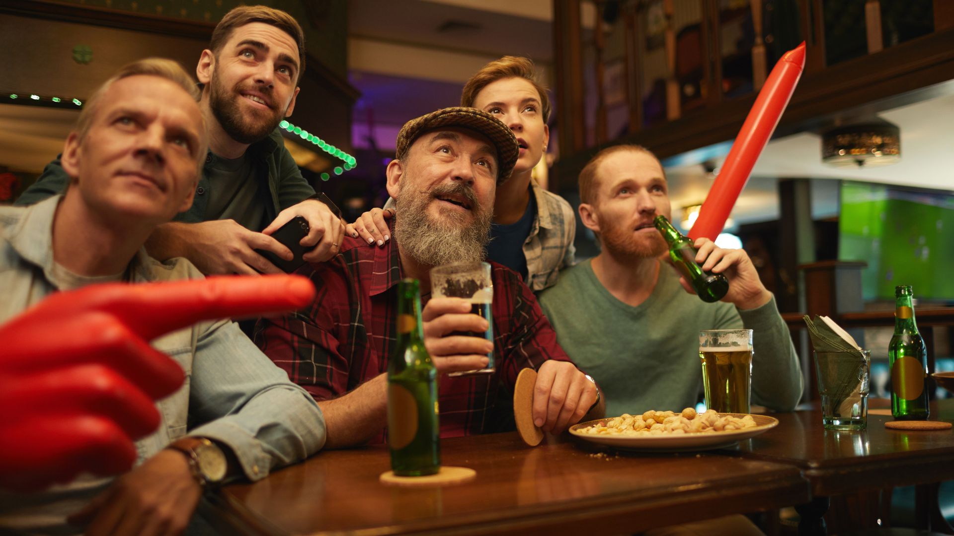 From Crispy Crusts to Cheers: Pizza And Sports Bar Moments